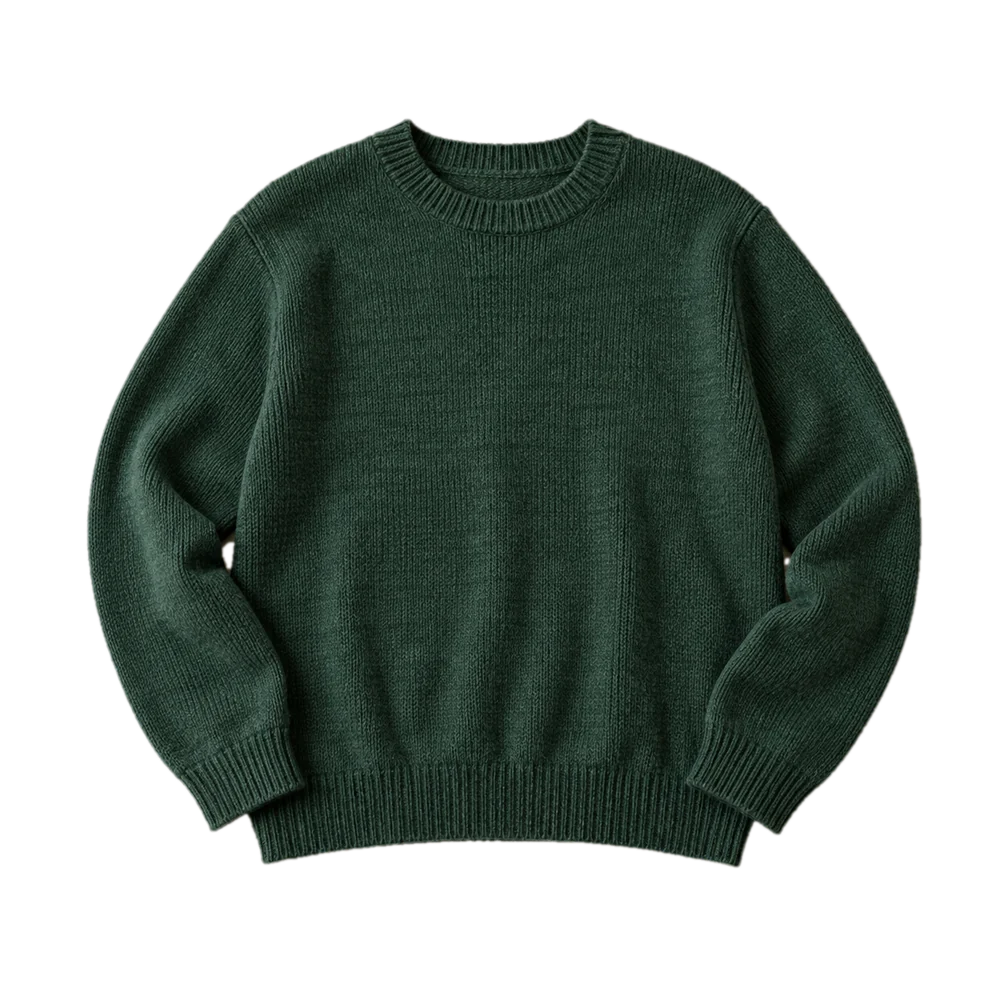 The green jumper shown on a concrete background